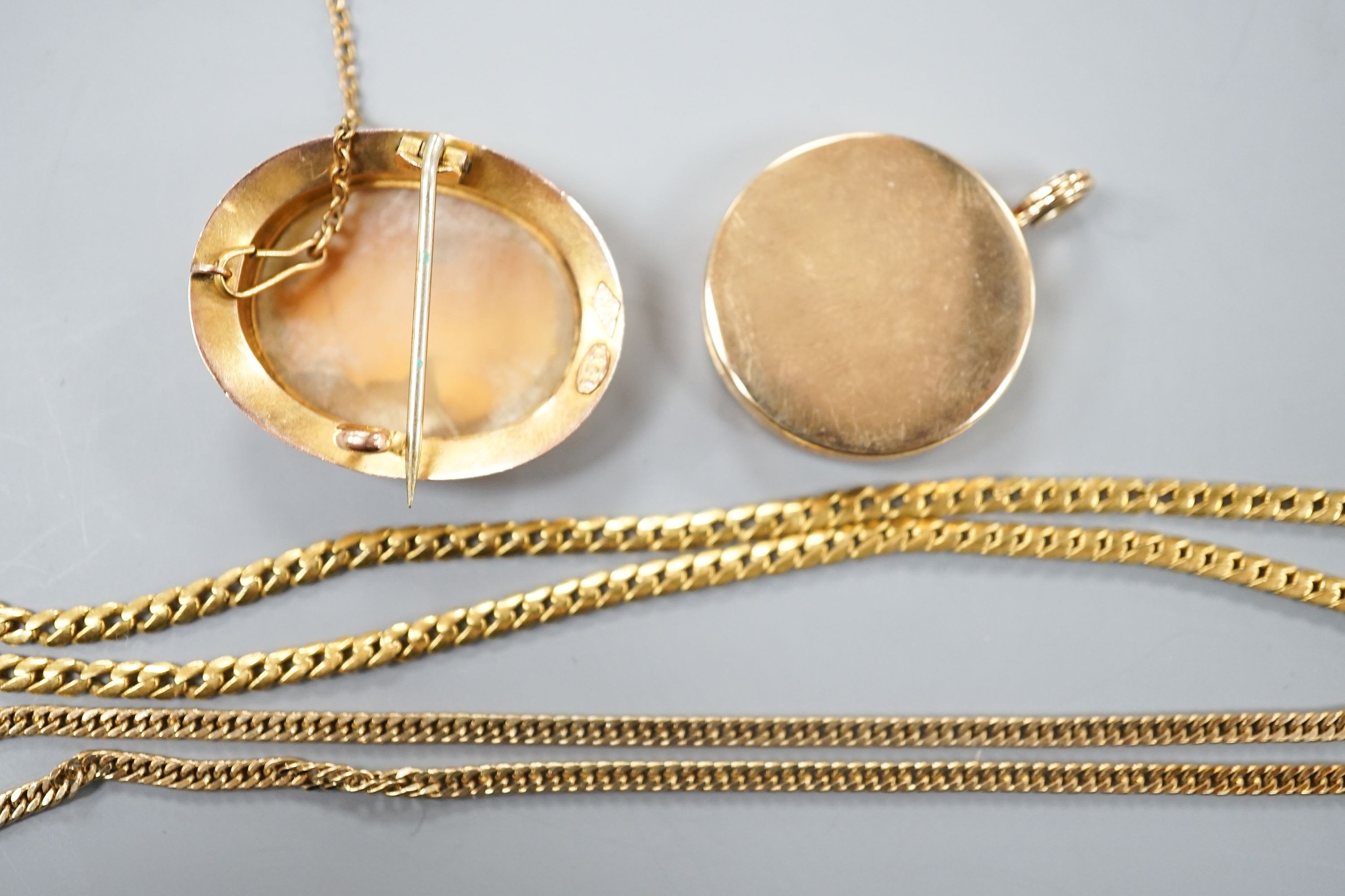 A 9ct gold 'serpent' necklet, 36cm, a 9ct mounted oval cameo shell brooch, a modern 9ct gold locket on a 9ct gold chain, gross 22.1 grams.